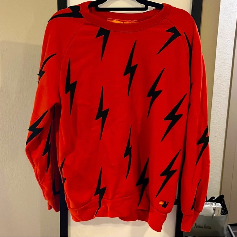 Aviator Nation red crewneck with black bolts